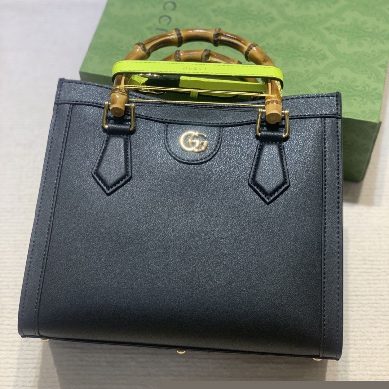 G*u*i top handle bags